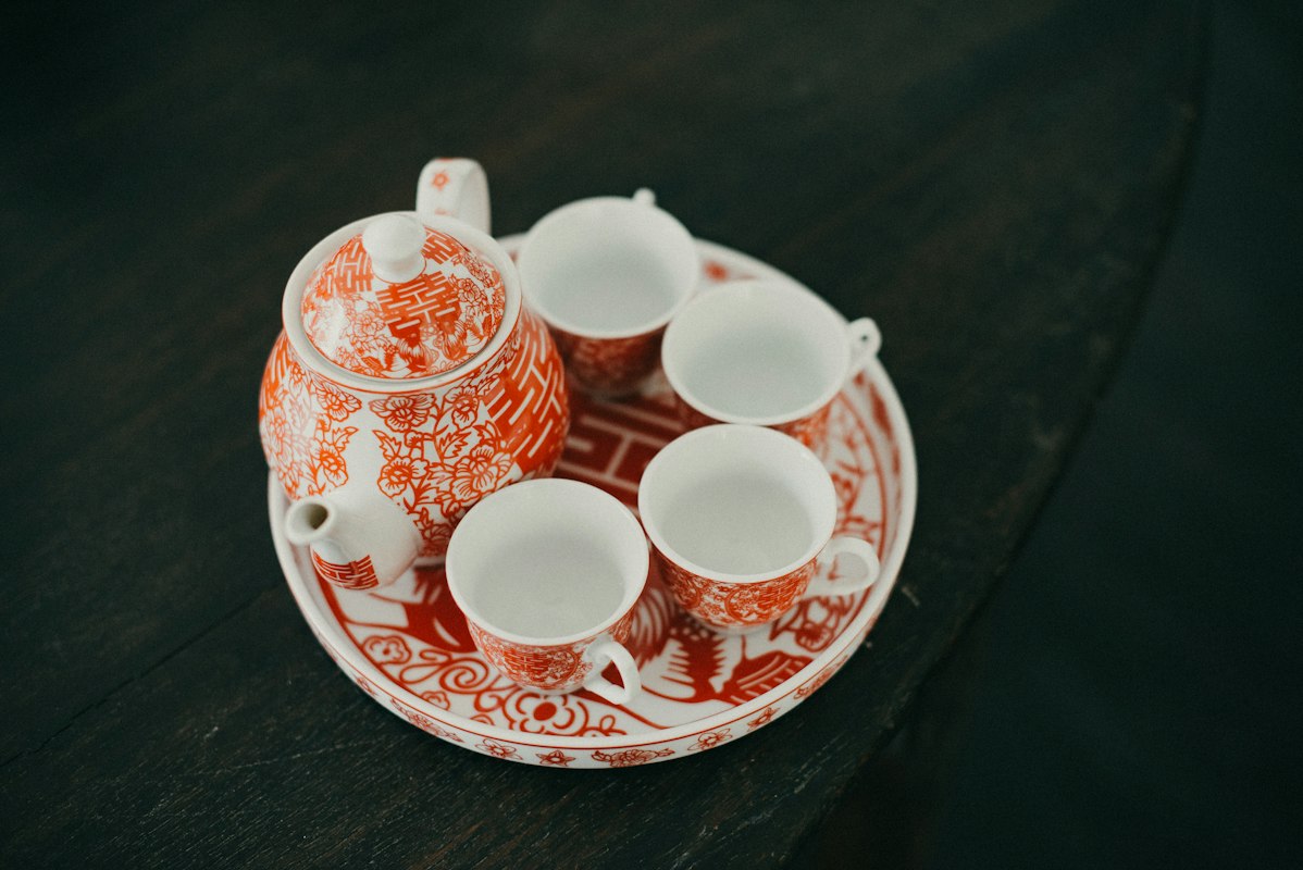 Handpainted floral tea cups pair